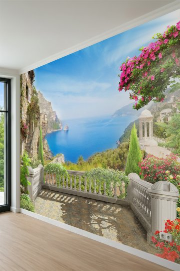 Dreamwall Taş Korkuluklu Teras, Pembe Çiçekler ve Sahil Kasabası Manzaralı Tek Parça Tekstil Duvar Kağıdı küçük görsel 3